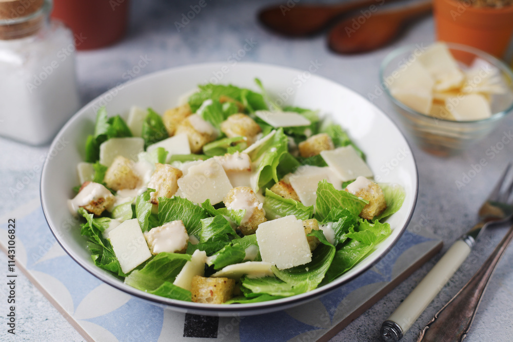A bowl with classic Caesar salad A bowl with classic Caesar salad