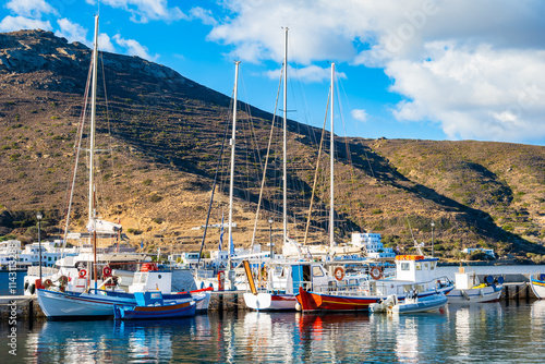 Obraz na płótnie Colorful boats anchoring in Katapola port with mountains in background, Amorgos island, Cyclades, Greece w salonie