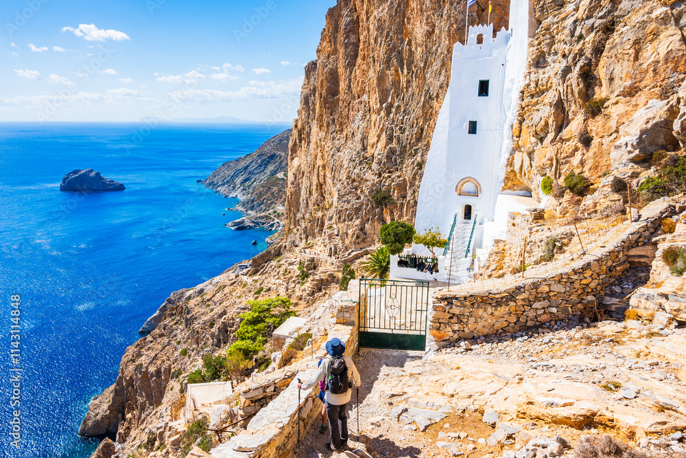 Famous white building of Panagia Hozoviotissa monastery hanging on the cliff side above the sea, Amorgos island, Cyclades, Greece