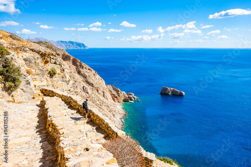 Obraz na płótnie Walking path along sea and high cliffs to Panagia Hozoviotissa monastery, Amorgos island, Cyclades, Greece w salonie