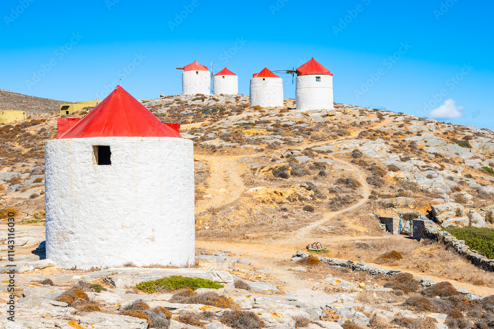 View of windmills near Chora village from trekking trail, Amorgos island, Cyclades, Greece