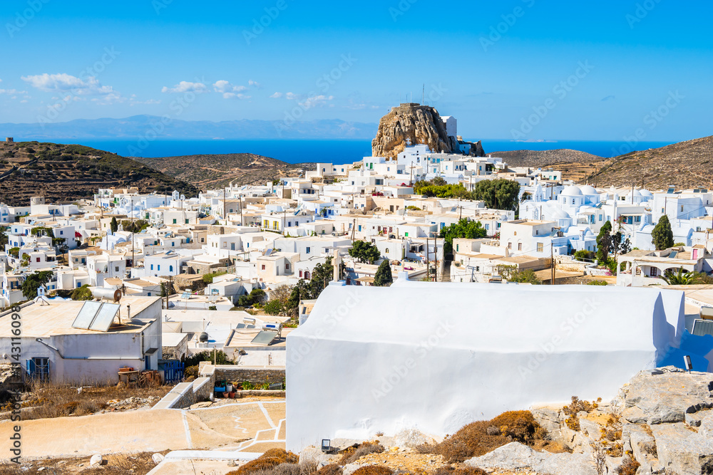 View of small chapel and Chora village from trekking trail, Amorgos island, Cyclades, Greece