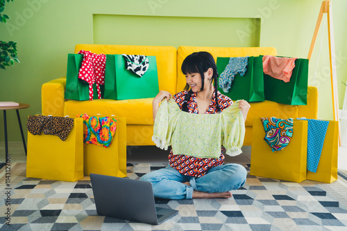 Full body portrait of nice young girl fitting blouse use laptop free time modern interior flat indoors photo