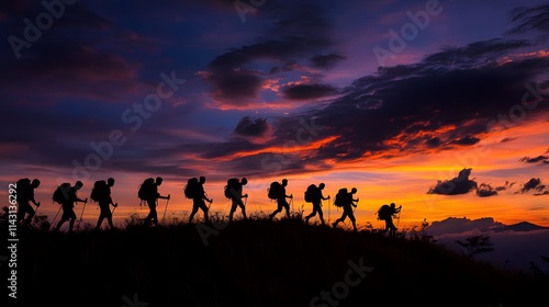 Mountain travel adventure with a group hiking at sunset