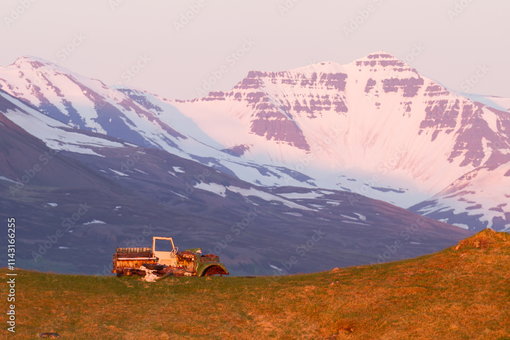 Naklejka premium old rusted tractor in the evening in iceland