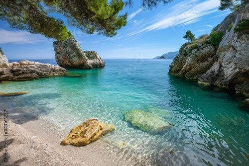 Fototapeta Naklejka Na Ścianę i Meble -  Crystal clear turquoise water gently lapping at a secluded beach in croatia