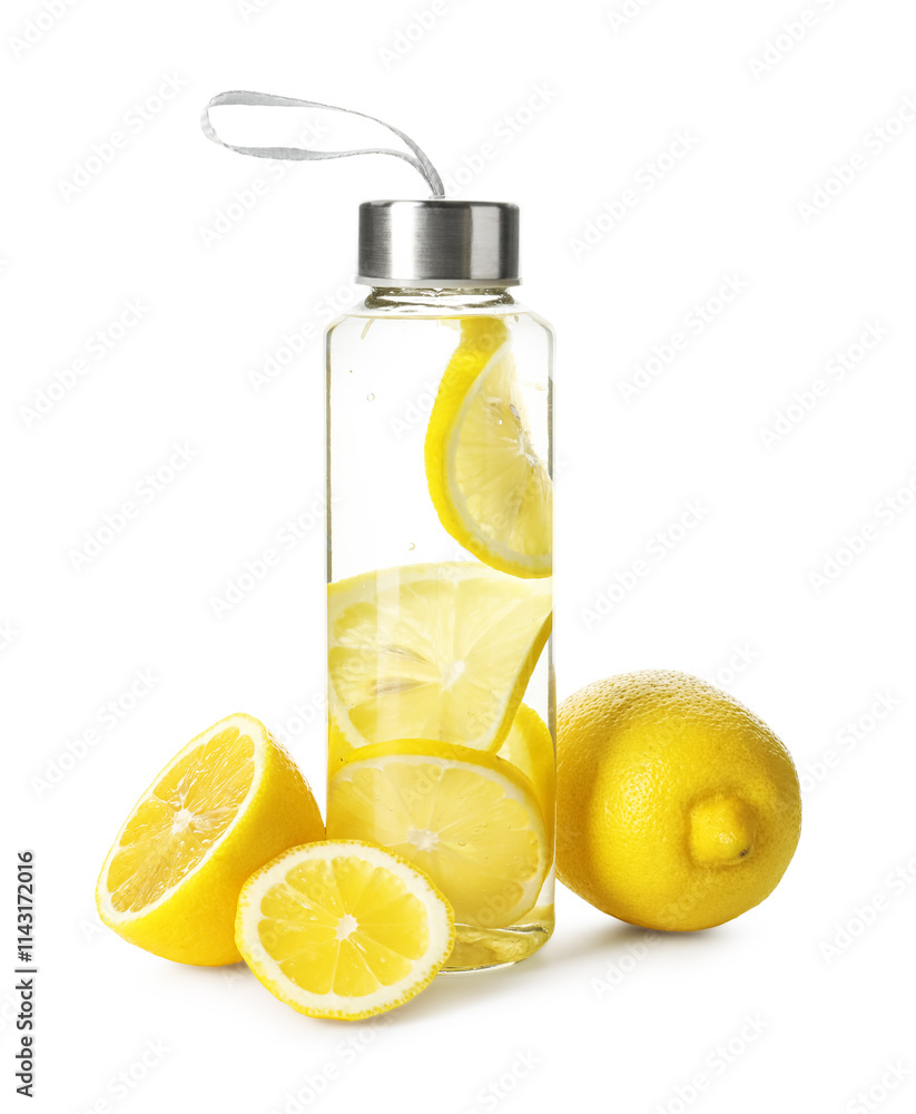 Lemon water in bottle and fresh fruits isolated on white Lemon water in bottle and fresh fruits isolated on white