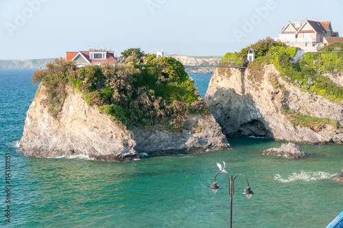 Newquay is a vibrant seaside town in England, renowned for its sandy beaches, stunning coastal cliffs, world-class surfing, and lively atmosphere, making it a top destination for holidaymakers.