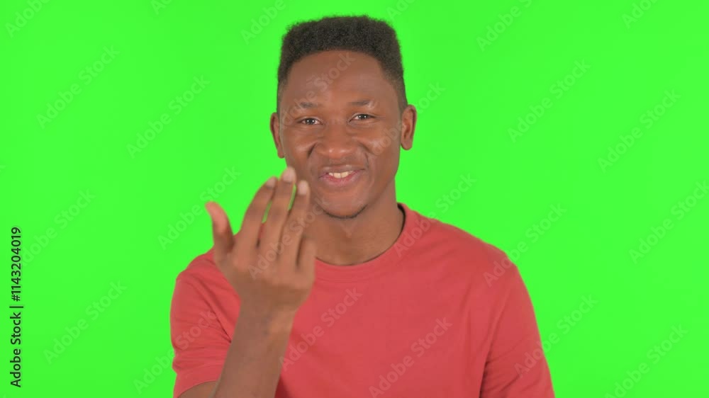 Portrait of African Man inviting People on Green Background Portrait of African Man inviting People on Green Background