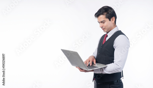 Successful businessman typing laptop looking communication standing over isolated white background. Handsome guy using digital gadget computer connection internet working copyspace.Technology wireless