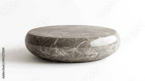 A smooth, round marble table with a polished surface, ideal for modern interiors.