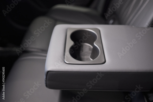 Vehicle armrest with cup holder, beige design, for luxury cars photo