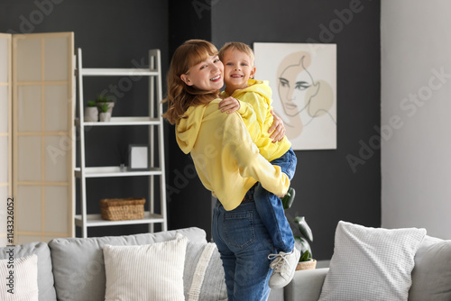 Happy mother and her little...
