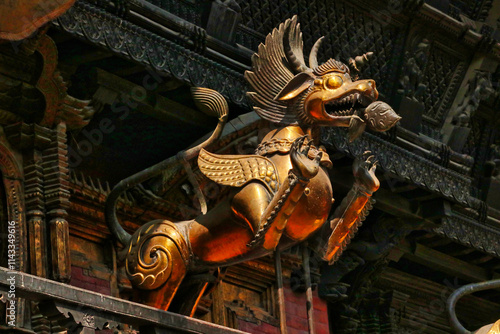 Photos A Flying lion like protector statue on the façade of the Akash Bhairab temple on