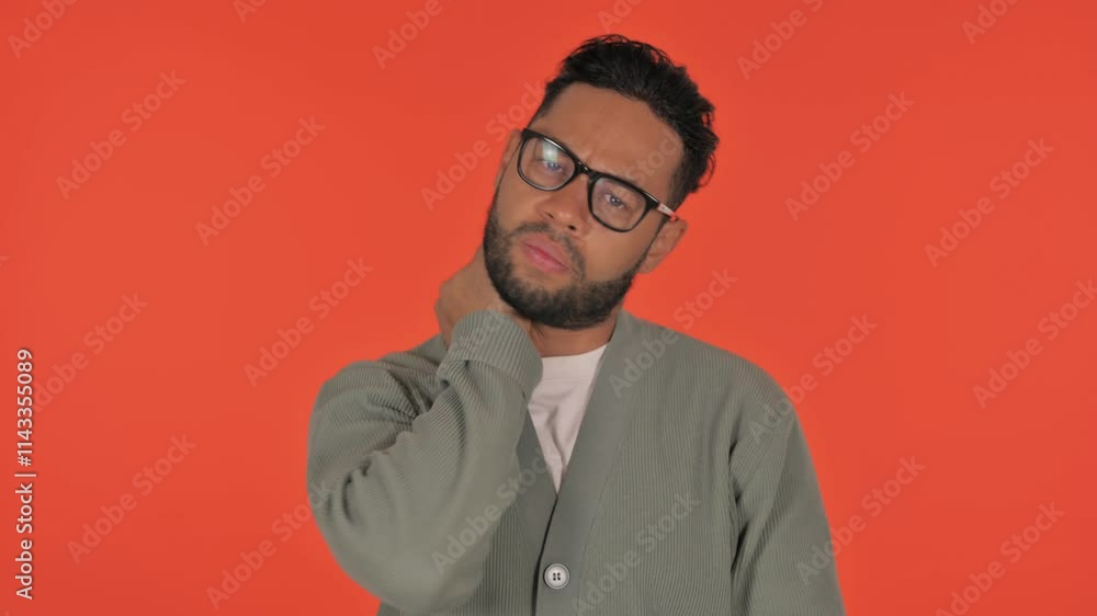 Casual Hispanic Man with Neck Pain on Red Background, Portrait Casual Hispanic Man with Neck Pain on Red Background, Portrait