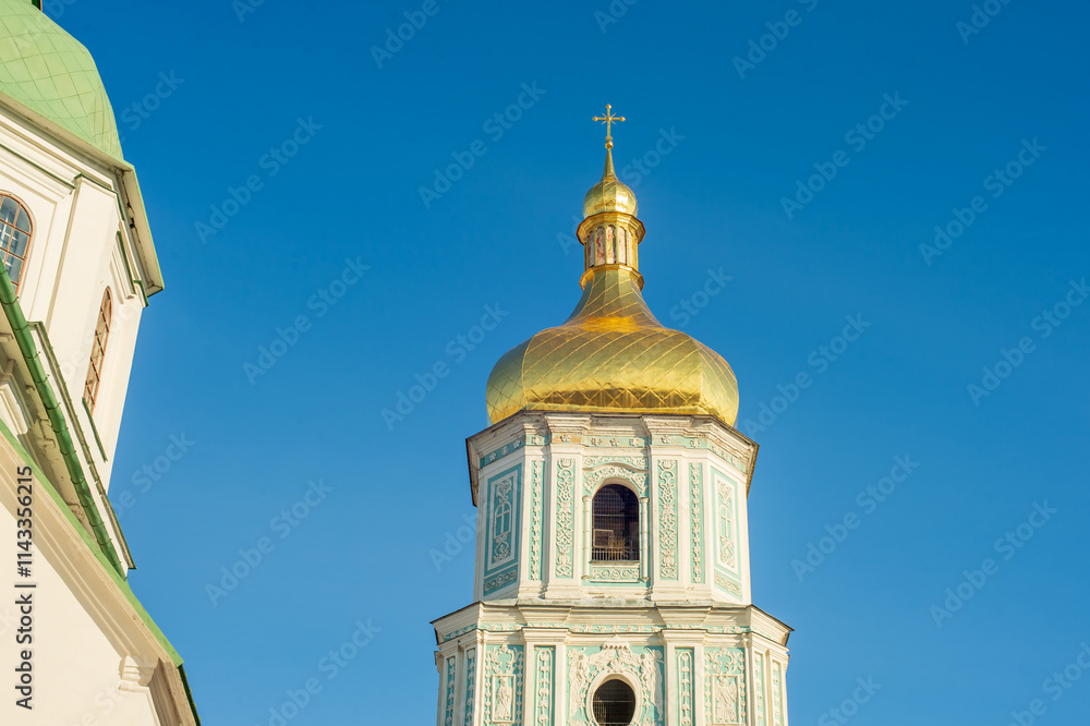gilded domes of st sophia cathedral in Kyiv against blue sky gilded domes of st sophia cathedral in Kyiv against blue sky