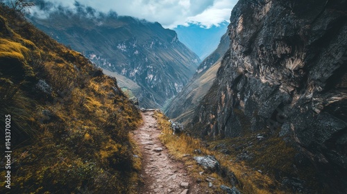 Narrow Trail Overlooking Deep Mountain Valley