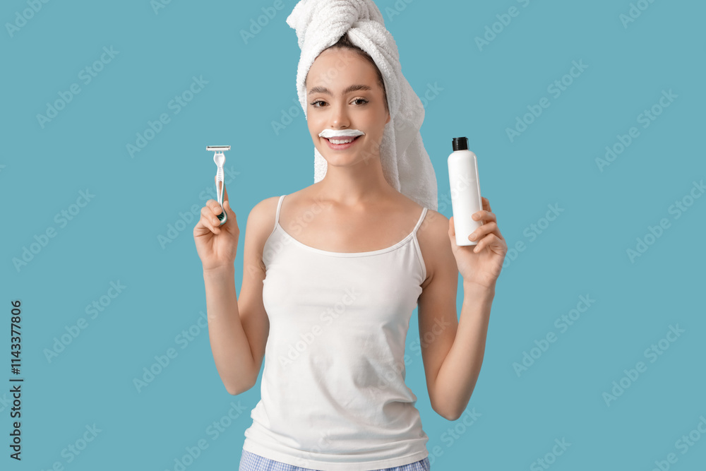 Beautiful young happy woman with razor and bottle of shaving foam on blue background Beautiful young happy woman with razor and bottle of shaving foam on blue background