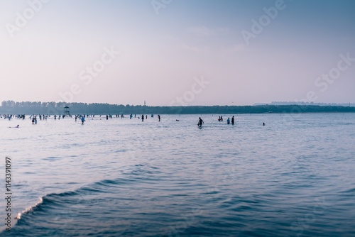 Enjoying summer activities at Pigeonhole Scenic Area in Beidaihe with families and friends in the water photo