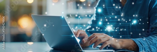 A person using a laptop, surrounded by digital effects that suggest connectivity and technology.
