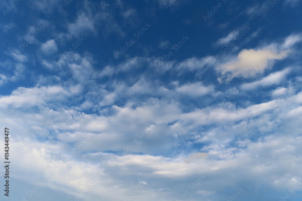 Beautiful cirrus clouds in blue sky, natural cloudscape Beautiful cirrus clouds in blue sky, natural cloudscape
