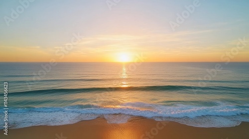 Breathtaking sunset over calm ocean waters, illuminating the horizon with vibrant colors, creating a serene atmosphere for relaxation and inspiration by the beach