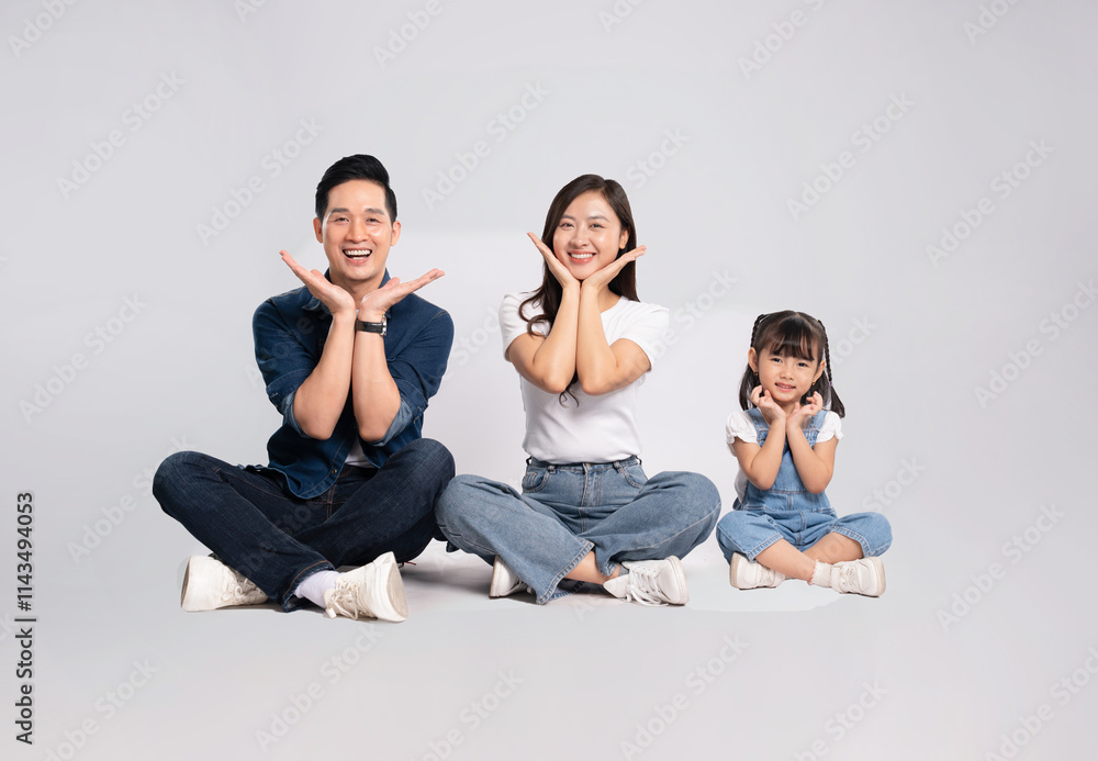 imagefull body of a happy asian family posing on a white background imagefull body of a happy asian family posing on a white background