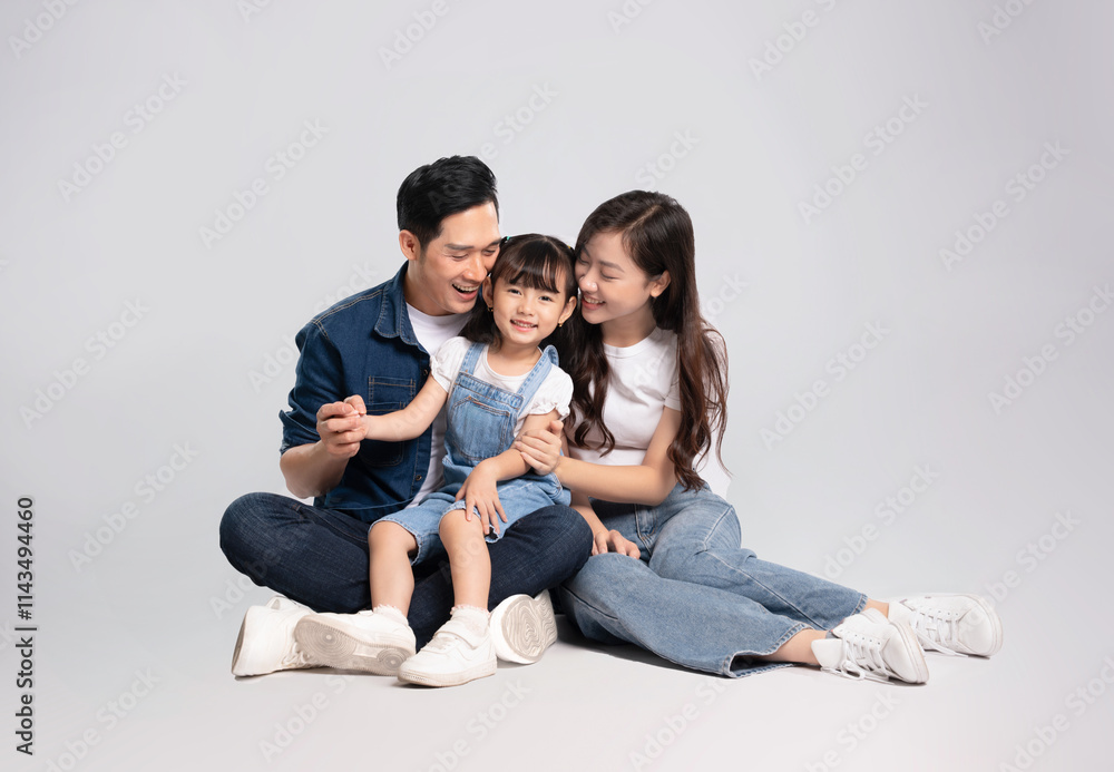 Imagefull body of a happy asian family posing on a white background Imagefull body of a happy asian family posing on a white background