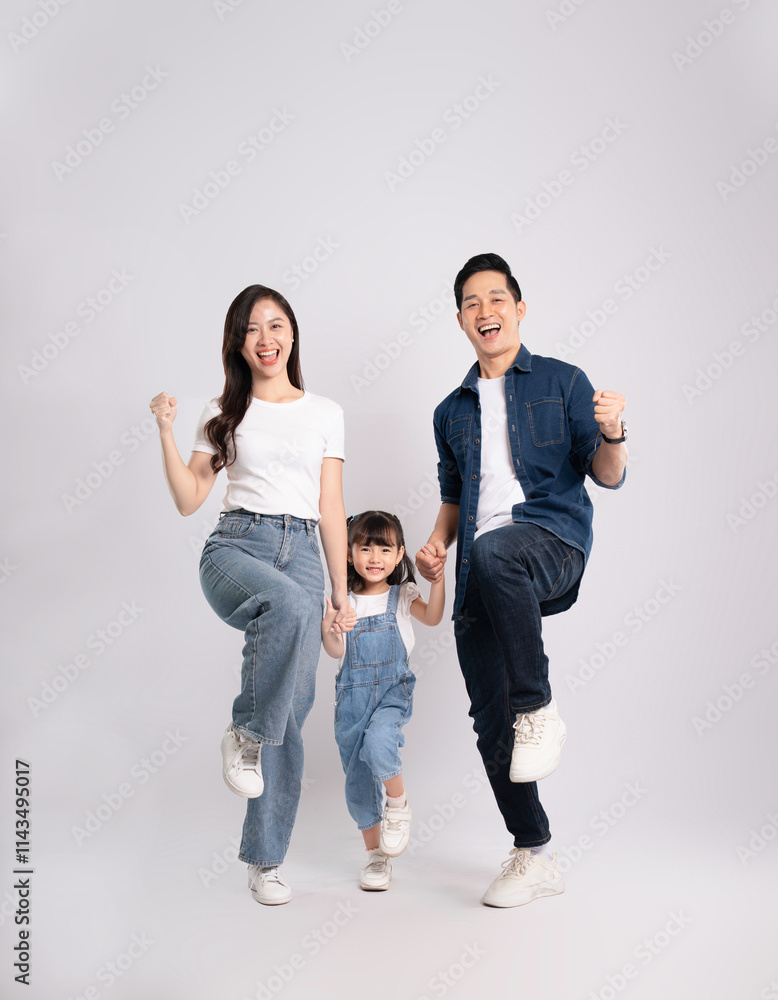 full body of a happy asian family posing on a white background full body of a happy asian family posing on a white background