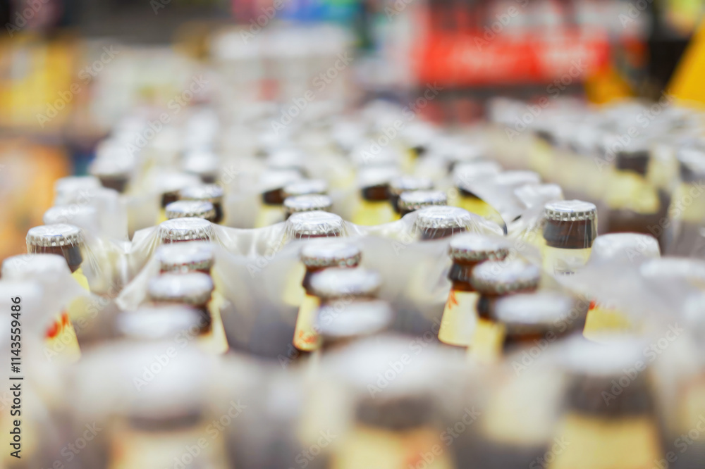 Bottles of beverages in a supermarket display Bottles of beverages in a supermarket display