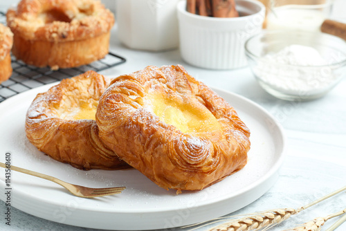 Danish pastry with icing sugar.