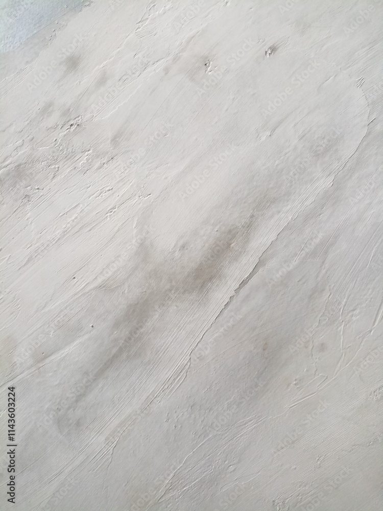 Obraz premium Gray paint texture applied with a brush on the surface, creating an artistic brush effect.