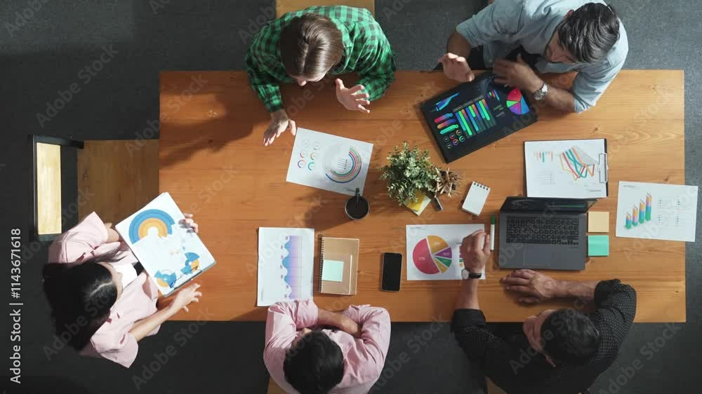 Top down view of businesswoman explain and present financial chart. Diverse group discuss and listening presentation about stock market statistic at meeting table with investment graph. Convocation.