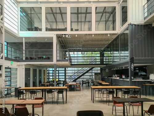 Buildings constructed by combining modular shipping containers, repurposed into cultural spaces, storage, and creative architecture.