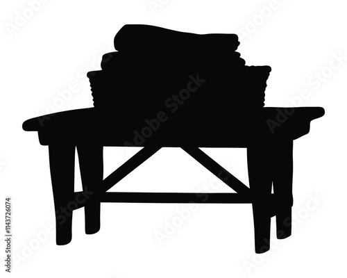 Basket of towels on a wooden table vector silhouette illustration photo