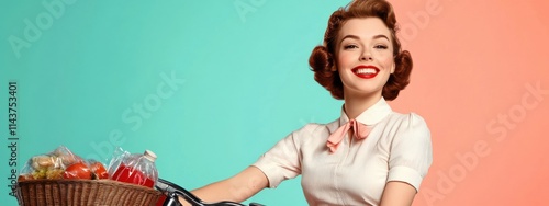 Happy Young Woman in Vintage Style Clothing Riding Bicycle with Basket Full of Fresh Fruits and Vegetables Against Colorful Background photo