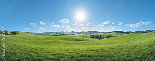 Wind turbines on expansive green hills under a cloudless blue sky, generating clean energy in a peaceful and picturesque countryside setting photo