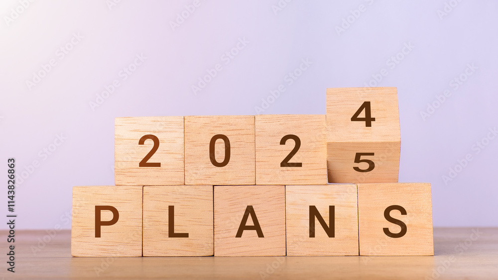 2025 plans concept. Flip wooden block with 2024 change to 2025. Business growth, goals, planning, Happy New Year 2025 plans concept. Flip wooden block with 2024 change to 2025. Business growth, goals, planning, Happy New Year