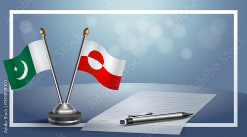 Pakistan and Greenland National flags on small table with bokeh background, cooperative relationship