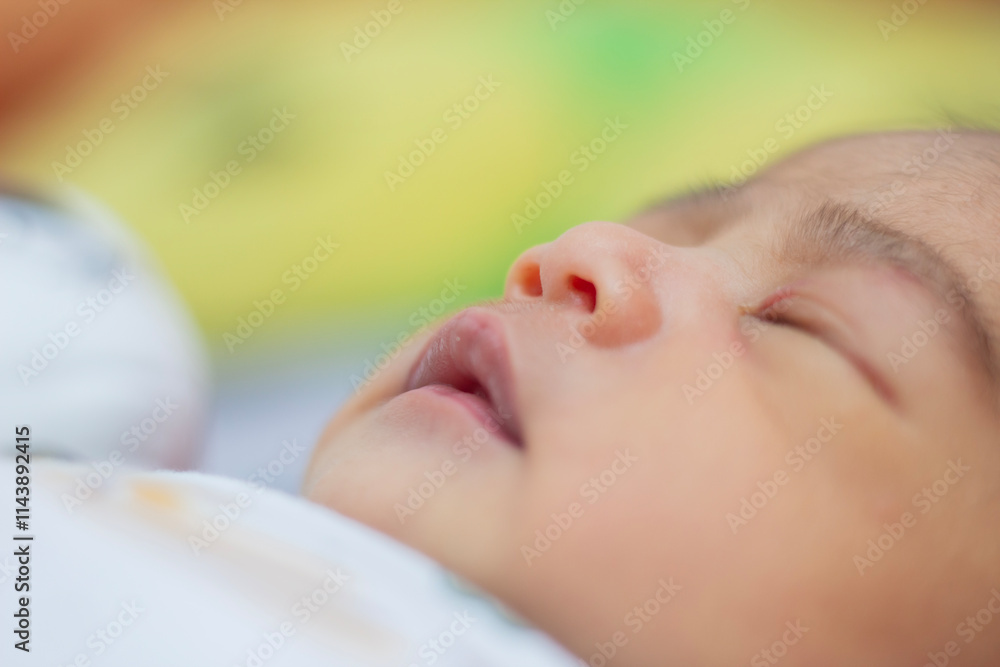 close-up detail of sleeping baby face with mouth and nose open, adorable and cute newborn baby close-up detail of sleeping baby face with mouth and nose open, adorable and cute newborn baby