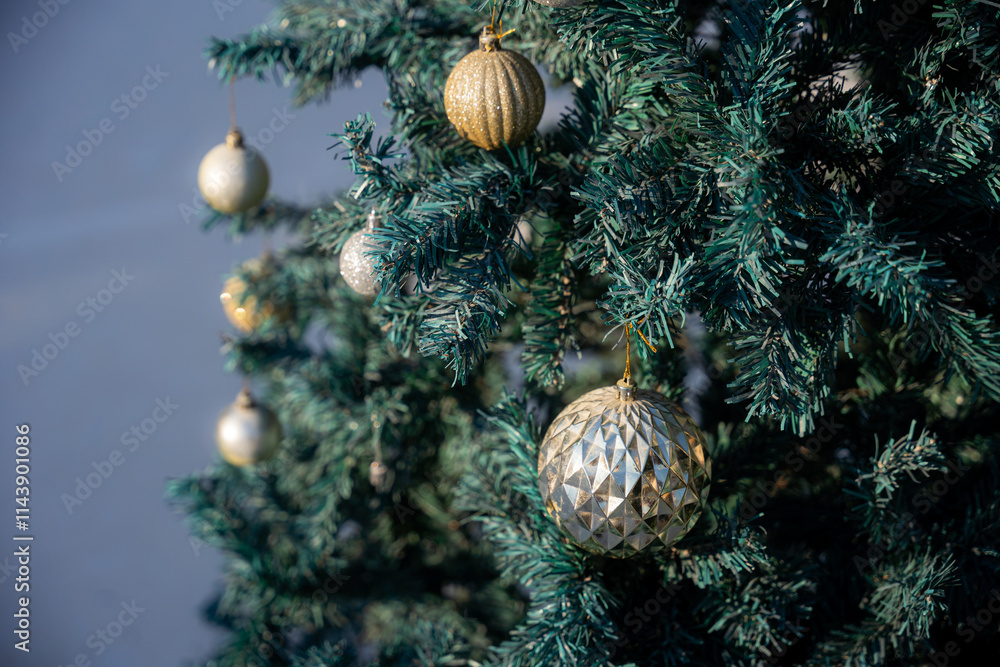 Merry x-mas,Close up of Colorful balls ,gifts box and Christmas greeting picture parcel,bell decoration on Green Christmas tree background Decoration During Christmas and New Year.