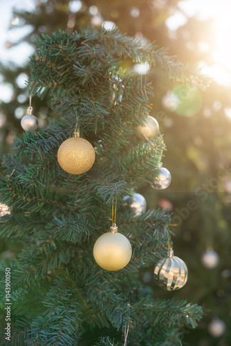 Merry x-mas,Close up of Colorful balls ,gifts box and Christmas greeting picture parcel,bell decoration on Green Christmas tree background Decoration During Christmas and New Year.