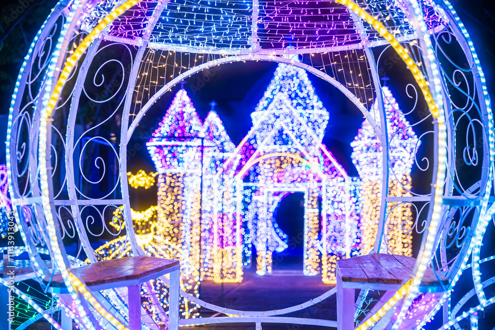 PHITSANULOK, THAILAND - December 15,2024:Decoration lights Christmas tree for celebrate Christmas and New Year Festival 2025 illumination at Saint Nicholas School in Phitsanulok City at night