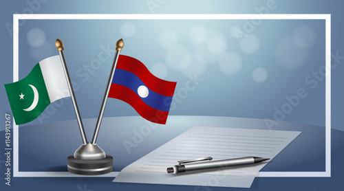 Pakistan and Laos National flags on small table with bokeh background, cooperative relationship
