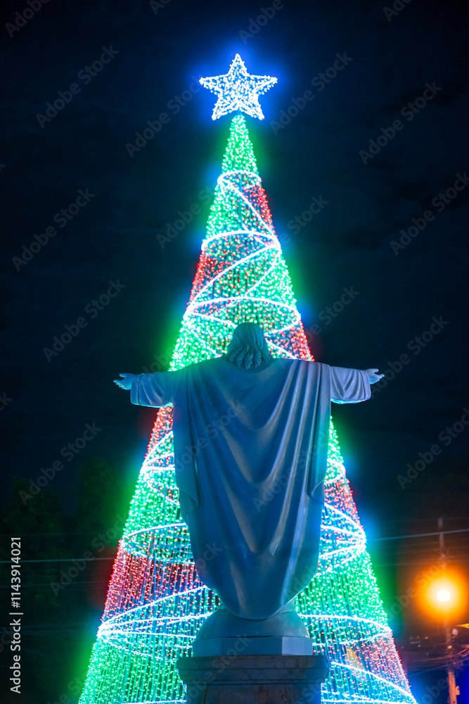 PHITSANULOK, THAILAND - December 15,2024:Decoration lights Christmas tree for celebrate Christmas and New Year Festival 2025 illumination at Saint Nicholas School in Phitsanulok City at night