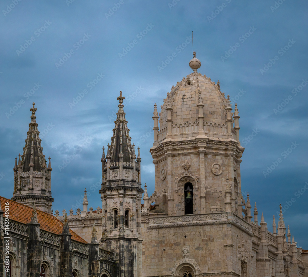 The magnificent spires and dome of the Jerónimos Monastery in Belém, Lisbon (Lisboa), Portugal. A masterpriece of Manuelite architecture and a UNESCO World Heritage Site The magnificent spires and dome of the Jerónimos Monastery in Belém, Lisbon (Lisboa), Portugal. A masterpriece of Manuelite architecture and a UNESCO World Heritage Site