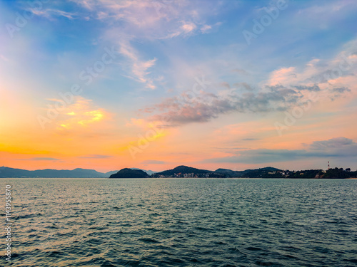 Sunset at CAPE PANWA PHUKET Thailand from sea
