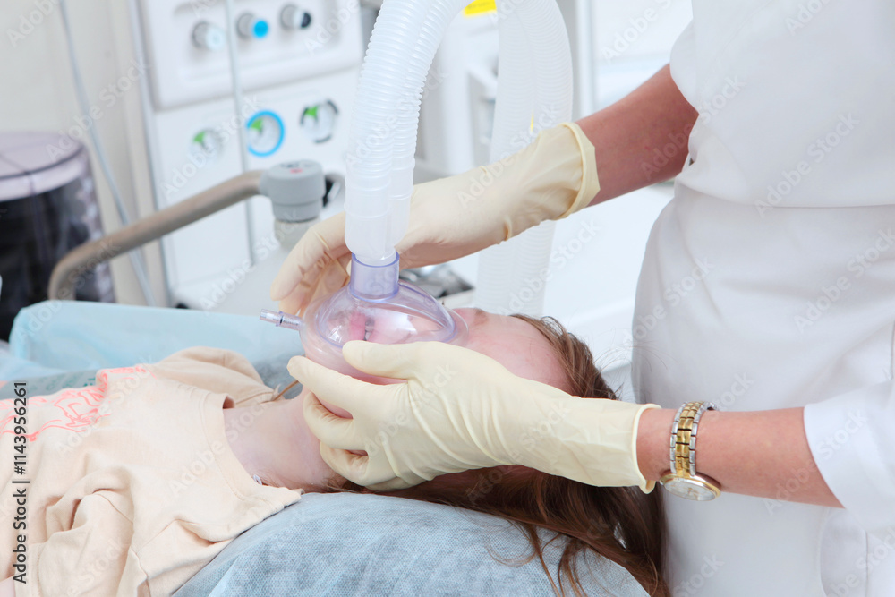 Child is under anesthesia. Small child is undergoing surgery. Concept of medical care. Child is under anesthesia. Small child is undergoing surgery. Concept of medical care.