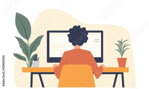 Man is sitting at a desk with a computer monitor in front of him