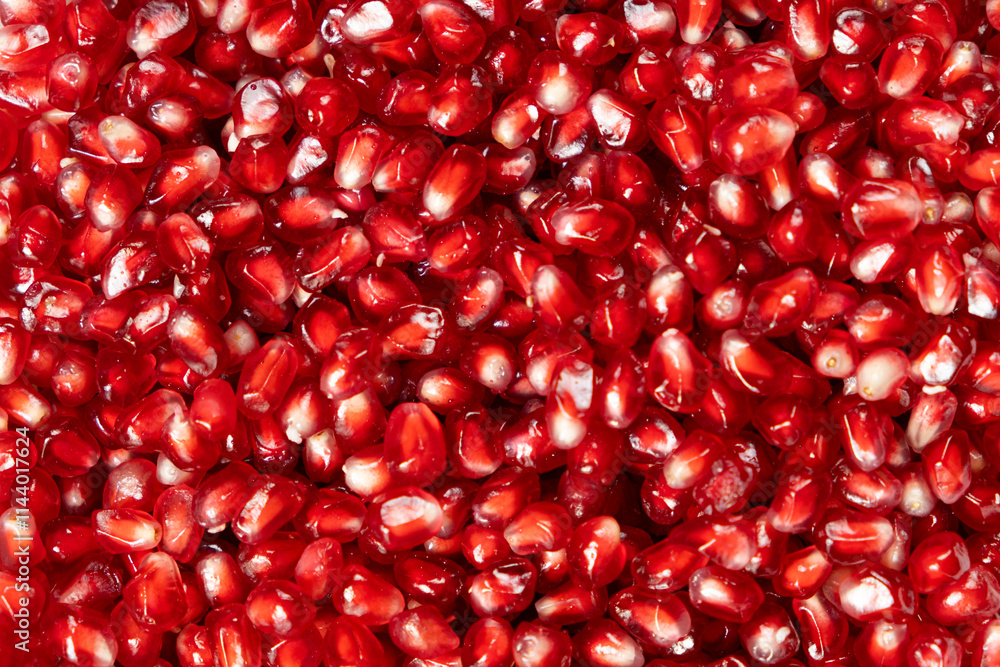 Ripe red pomegranate seeds close-up top view Ripe red pomegranate seeds close-up top view